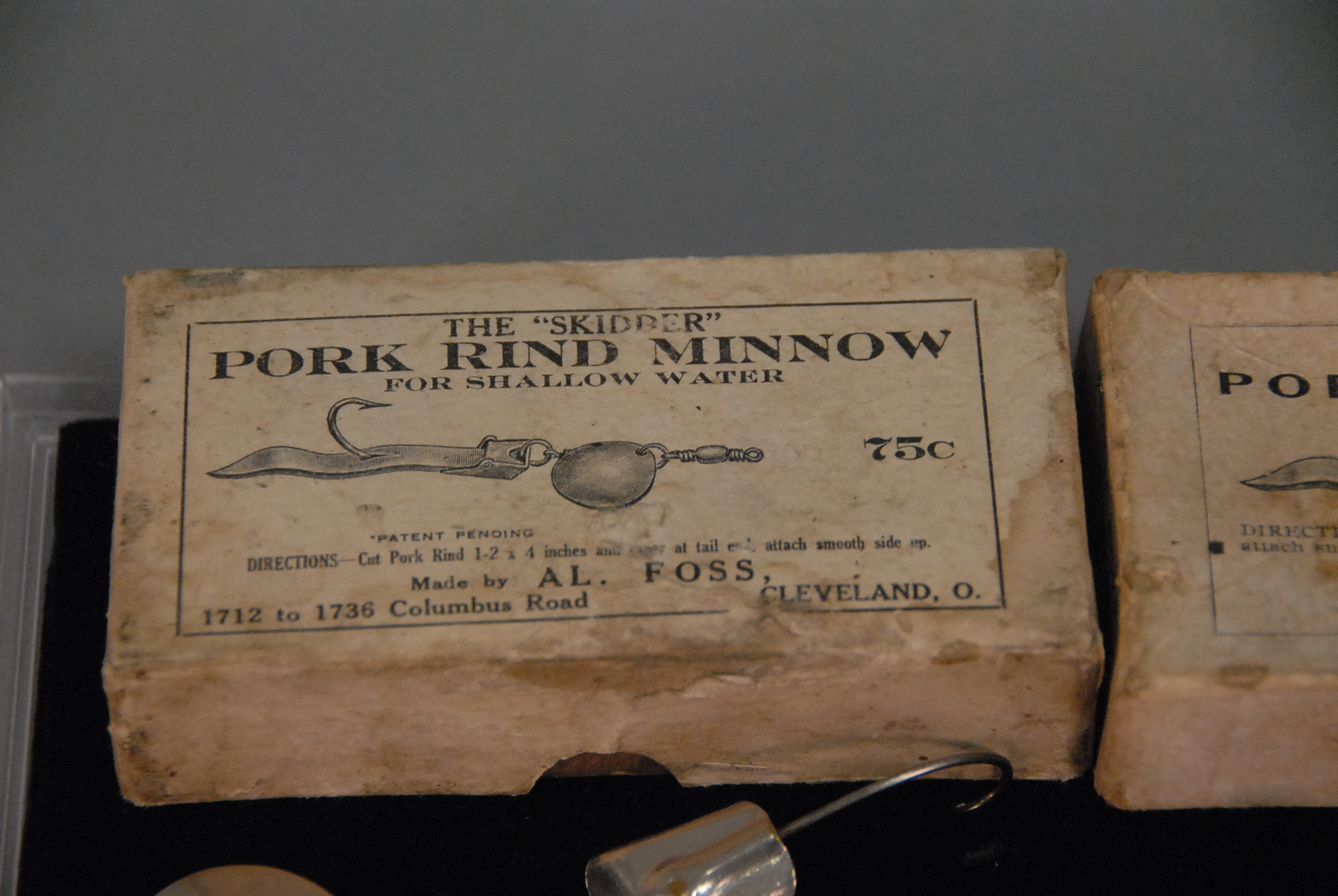 Lot 173: Two rare original Al Foss pork rind minnow lures with